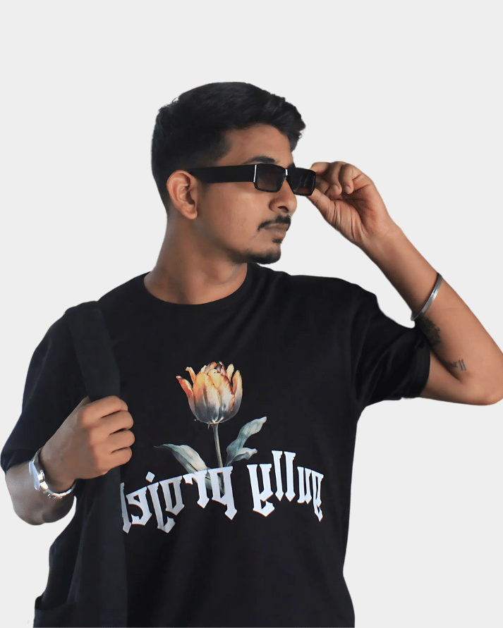 Man wearing Gully Projekt Daydream Bloom oversized t-shirt with floral graphic and sunglasses