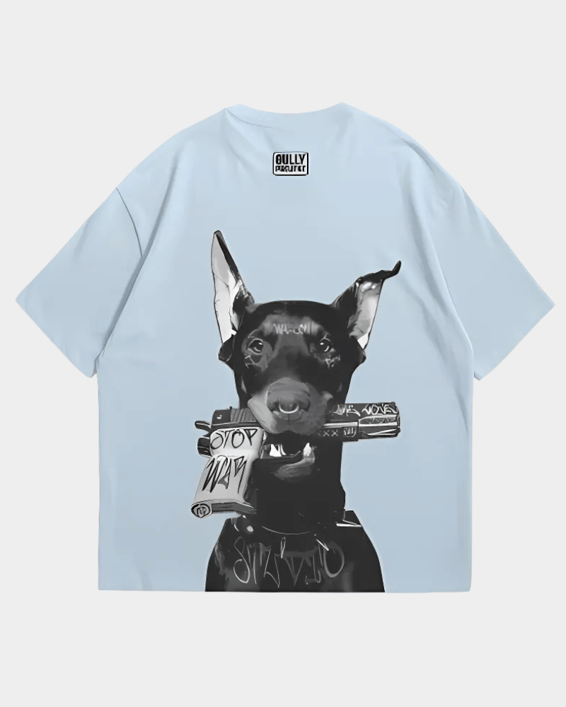 Light blue premium urban fashion DAWG tee by Gully Projekt with black dog graphic holding a scroll